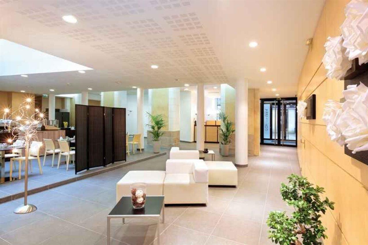 อัปปาร์ตซิตี้ กงฟอร์ นองต์ ซองทร์ Aparthotel น็องต์ ภายนอก รูปภาพ