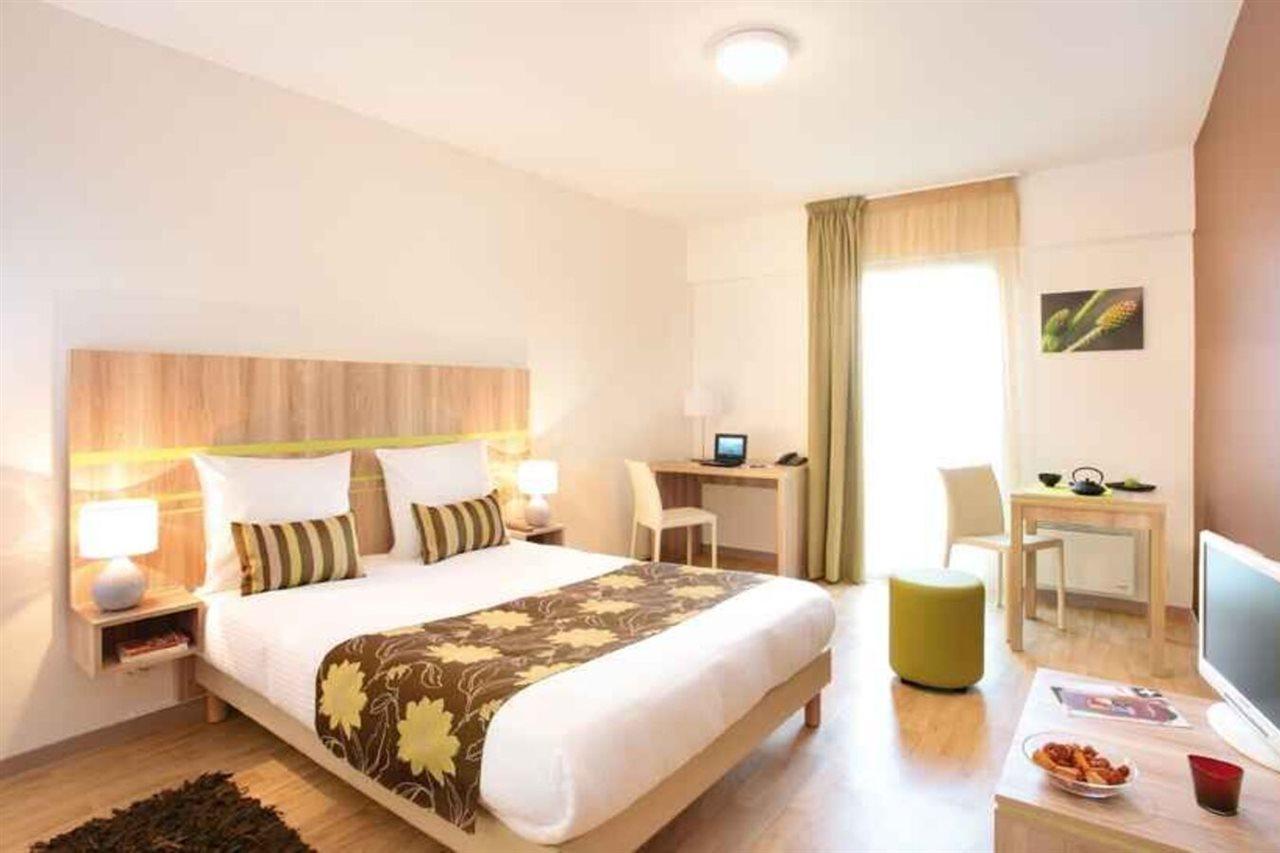อัปปาร์ตซิตี้ กงฟอร์ นองต์ ซองทร์ Aparthotel น็องต์ ภายนอก รูปภาพ