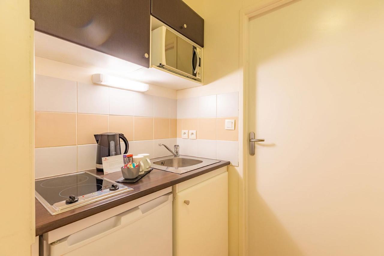 อัปปาร์ตซิตี้ กงฟอร์ นองต์ ซองทร์ Aparthotel น็องต์ ภายนอก รูปภาพ