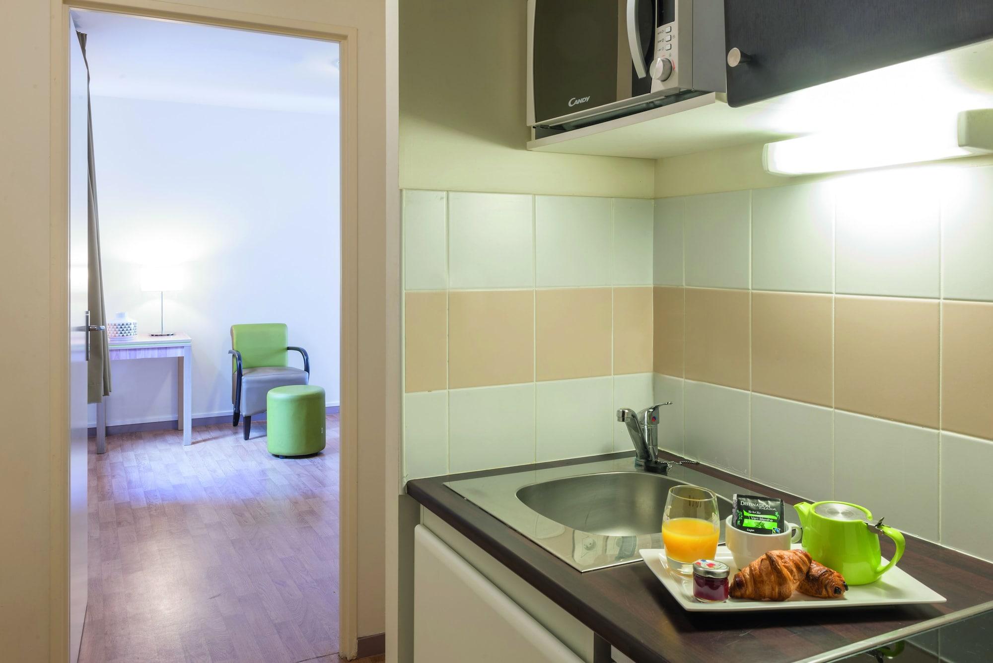 อัปปาร์ตซิตี้ กงฟอร์ นองต์ ซองทร์ Aparthotel น็องต์ ภายนอก รูปภาพ