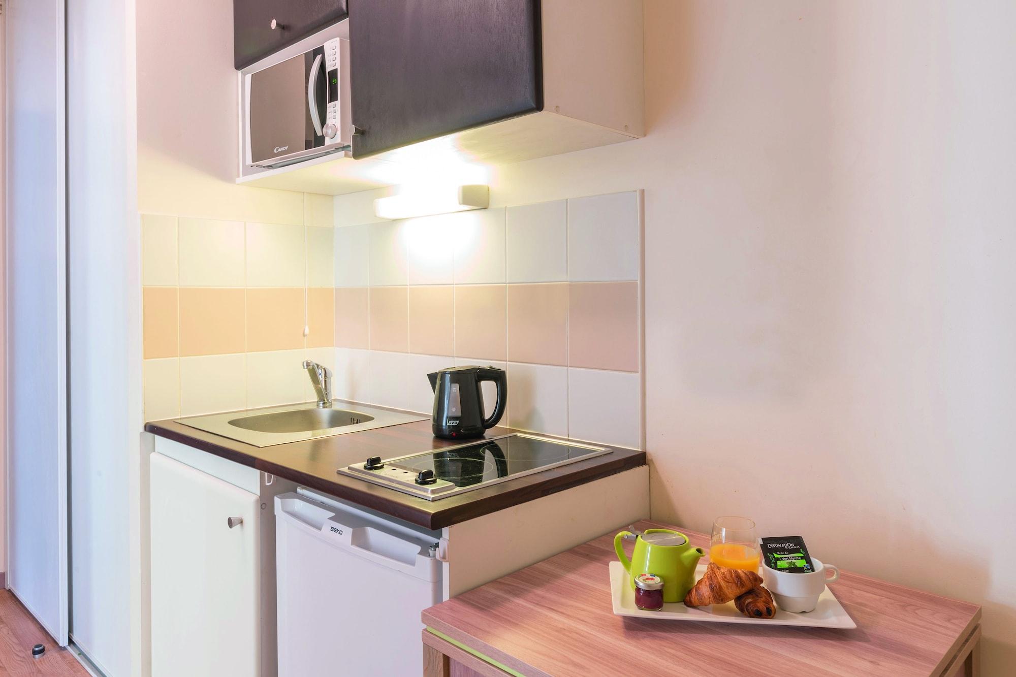 อัปปาร์ตซิตี้ กงฟอร์ นองต์ ซองทร์ Aparthotel น็องต์ ภายนอก รูปภาพ
