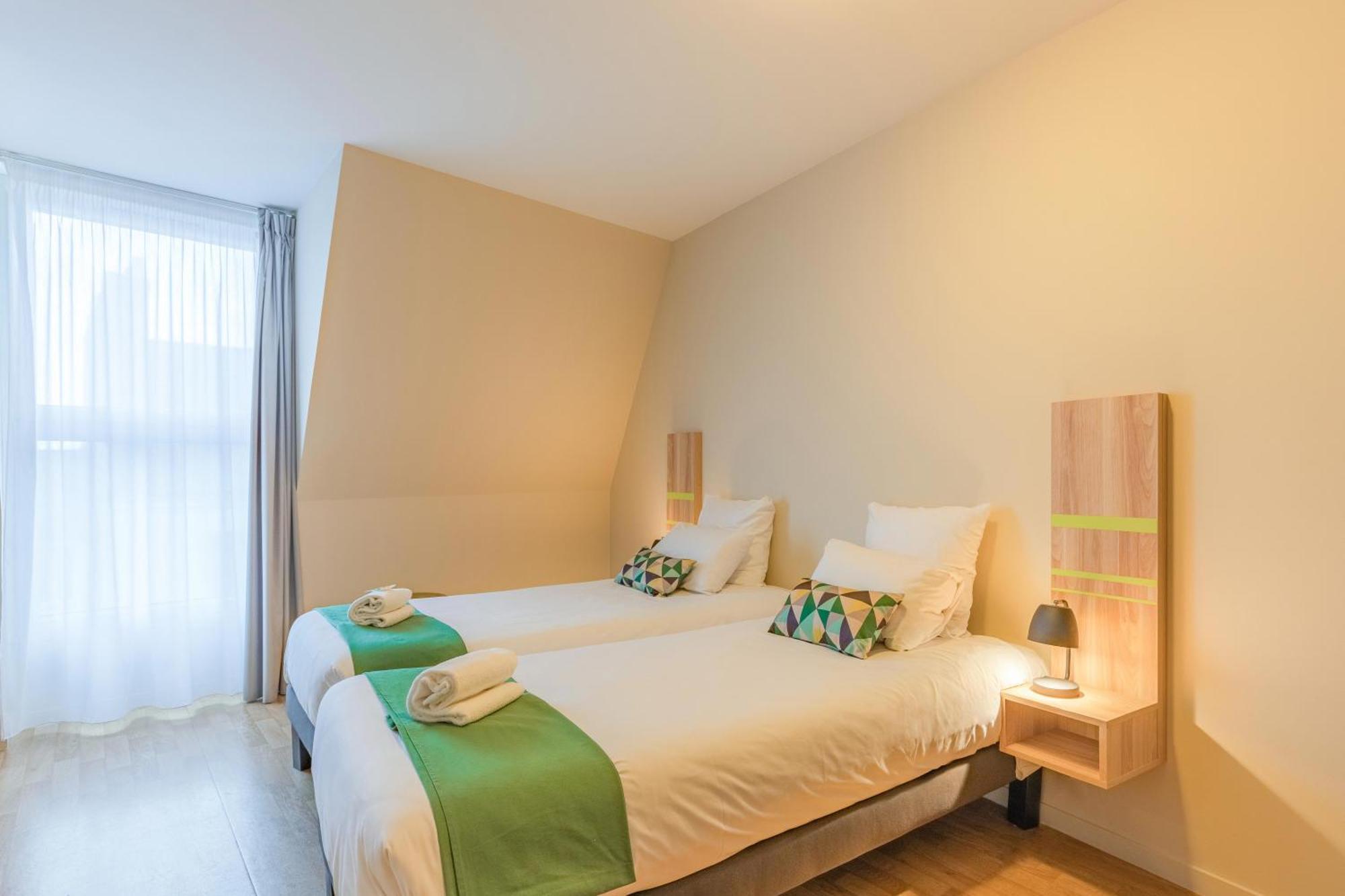 อัปปาร์ตซิตี้ กงฟอร์ นองต์ ซองทร์ Aparthotel น็องต์ ภายนอก รูปภาพ
